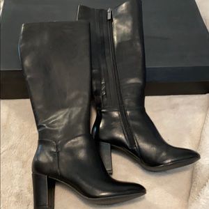 Halston on leather tall boots